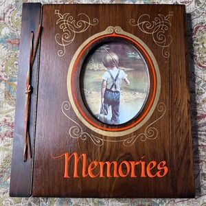 Vintage wooden photo album with "Memoriesquot; inscription and frame -core